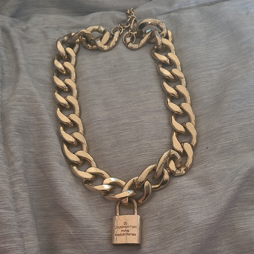 Louis Vuitton Gold Chain Necklace with Lock Pendant.